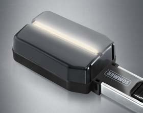 The Sommer evo+ operator head with integrated LED light riding the rail